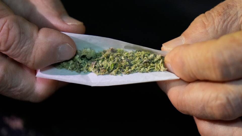 DOJ Relaxes Marijuana Rules — But Gun Owners Still in the Crosshairs