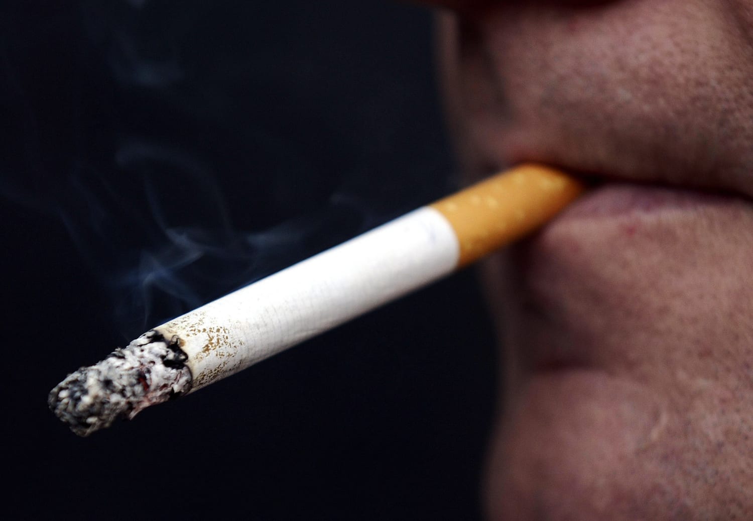 Person Smoking a Cigarette