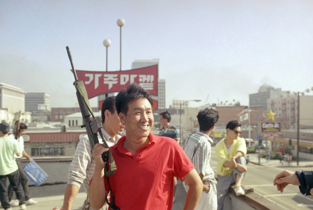 Mr. Park during the LA Riots 1992 with his Daewoo K1A1 Rifle