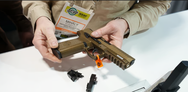 Mihály Istvánovics showing the G9HSP Pistol