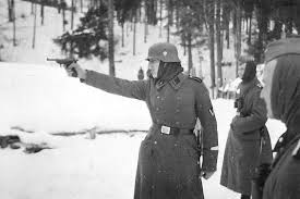 A German Soilder Using a Walther P-38 Pistol